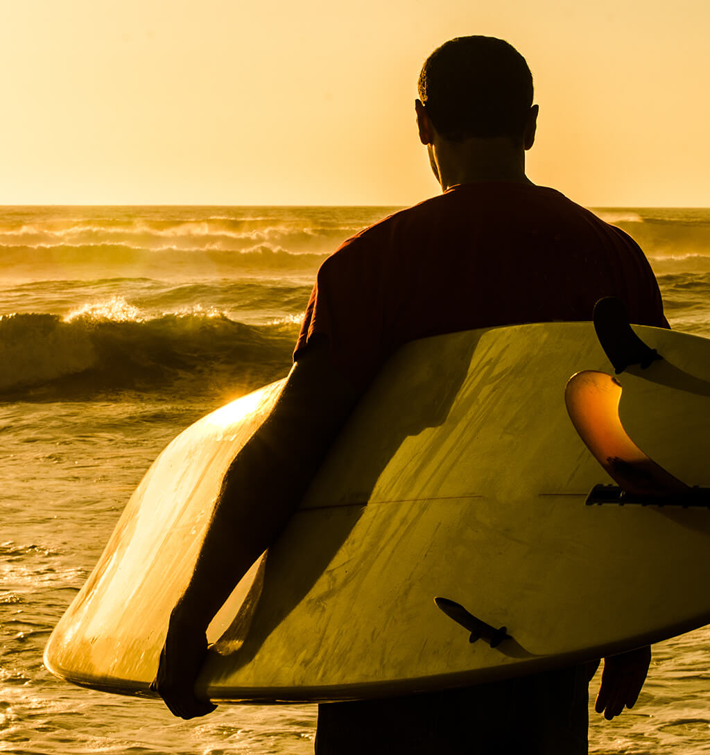 Surfer looking at waves