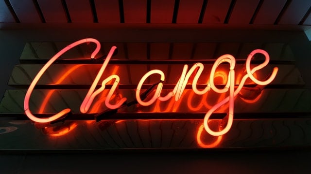 A neon sign saying change