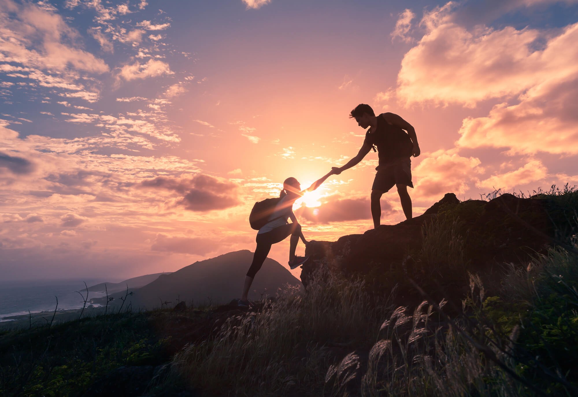 Hiker helping someone